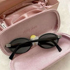 Miu Miu oval Noir