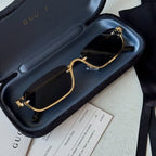 Gucci Noir gold